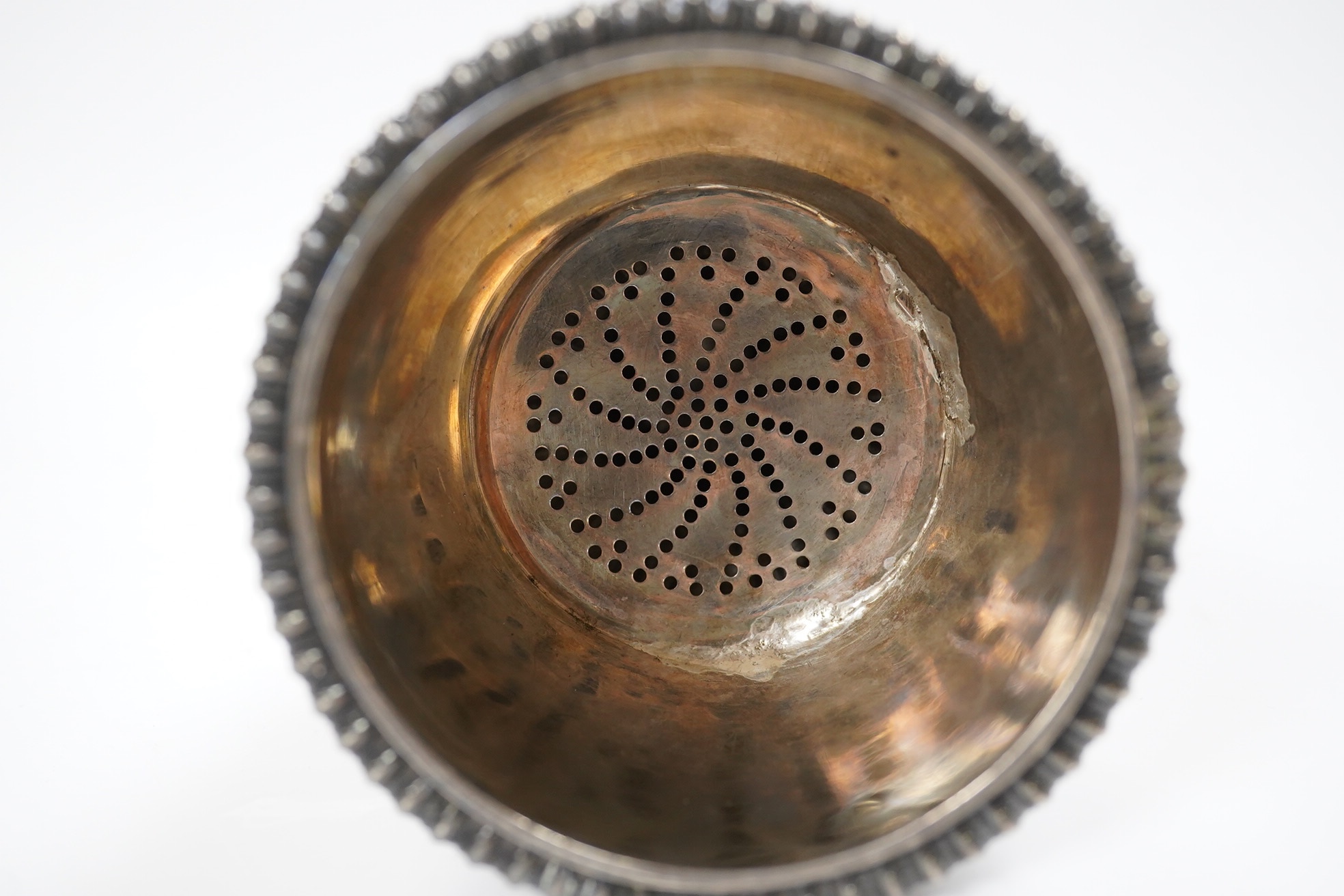 A late George III silver wine funnel, London, 1818, 14.3cm, repaired. Condition - poor